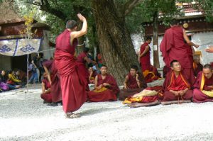 Tibet: Lhasa - Sera Monastery. The courtyard buzzes with the noise