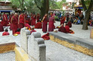 Tibet: Lhasa - Sera Monastery. The courtyard contains a few graves.