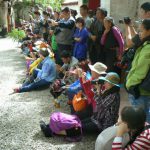 Tibet: Lhasa - Sera Monastery. Spectators seem enthralled at the sound