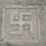 Tibet: Lhasa - Sera Monastery. A swastika carved into a stone