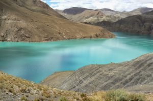 Tibet - a man-made dammed lake shimmers with a surreal