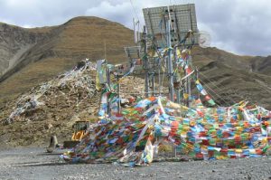 Tibet - prayer flags are hung on any high-altitude peak