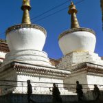 Tibet - stupas and pilgrims at Tashilhunpo Monastery.