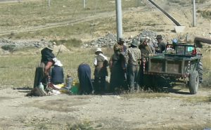 Tibet - farmers getting ready to go home after