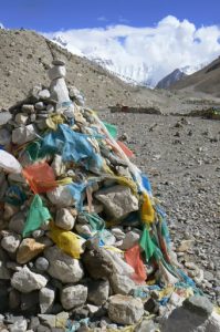 Tibet - a rock ovoo with Everest in the background.