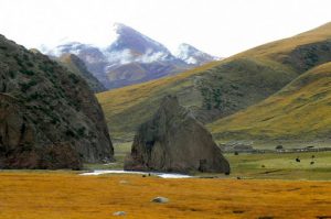 Tibet - colorful view of the distant mountains and nearby