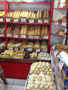 Uzbekistan - Tashkent:  cookie shop at the Mirobod Market.