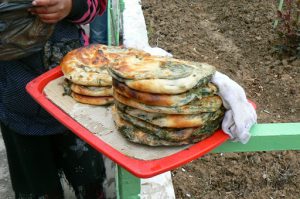 Uzbekistan - Tashkent:  spinach and cheese non bread 'pies' in