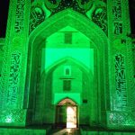 Uzbekistan: Bukhara the Nadir Divanbegi Medressa at night.