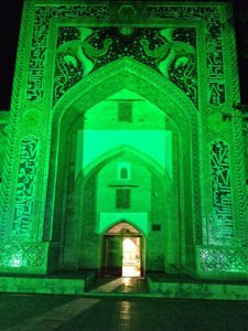 Uzbekistan: Bukhara the Nadir Divanbegi Medressa at night.