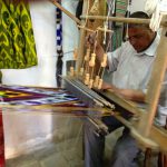 Uzbekistan: Bukhara Sayfiddin silk weaver's shop.