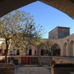 Uzbekistan: Bukhara Sayfiddin courtyard????where camels were watered.; ????it now????houses craft shops
