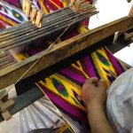 Uzbekistan: Bukhara Sayfiddin silk weaver's shop.