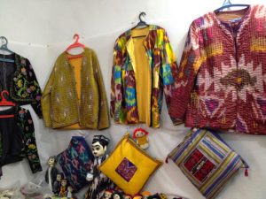 Uzbekistan: Bukhara Sayfiddin silk clothing shop.