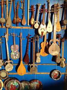 Uzbekistan: Bukhara Sayfiddin musical instrument shop.