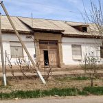 Uzbekistan: Khiva On the road from Bukhara to Khiva; a typical farmhouse--long