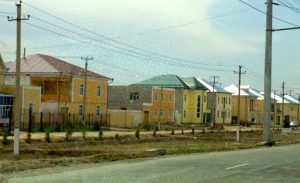 Uzbekistan: Khiva Closer to Khiva the new houses have more color.