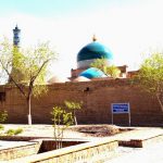 Uzbekistan: Khiva colorful minaret and mosque.