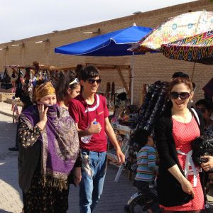 Uzbekistan: Khiva local family touring in central Khiva.