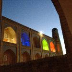 Uzbekistan: Khiva the evening exterior lights of our Orient Star hotel.