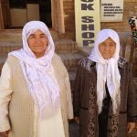 Uzbekistan: Khiva Two senior women visiting the town.