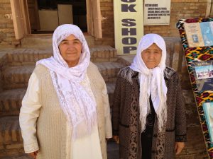 Uzbekistan: Khiva Two senior women visiting the town.