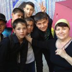 Uzbekistan: Khiva Teacher and student visiting the city.