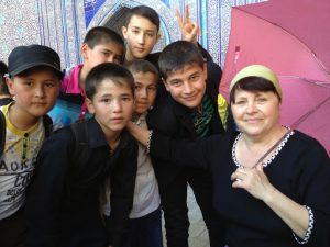 Uzbekistan: Khiva Teacher and student visiting the city.