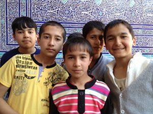Uzbekistan: Khiva More students with ornate blue and white glazed ????tile