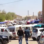 Uzbekistan: Khiva outside the city walls are the local citizens and