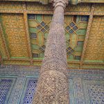 Uzbekistan: Khiva Colored ceiling, glazed tile wall and carved pillar of