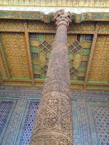 Uzbekistan: Khiva Colored ceiling, glazed tile wall and carved pillar of