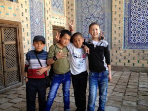 Uzbekistan: Khiva Students at he Tosh Hovli Palace with various geometric