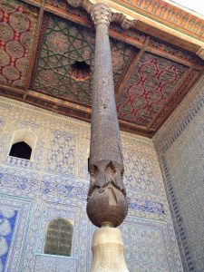 Uzbekistan: Khiva Ornate carved column and painted ceiling at he Tosh