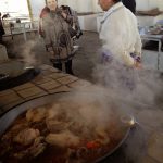 Uzbekistan: Bukhara kitchen preparing sheep stew for a family who have