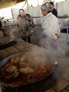 Uzbekistan: Bukhara kitchen preparing sheep stew for a family who have