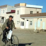 Uzbekistan: Nukus Local transport on unpaved back streets in town.