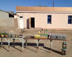 Uzbekistan: Nukus Roadside store selling beverages. No ice.