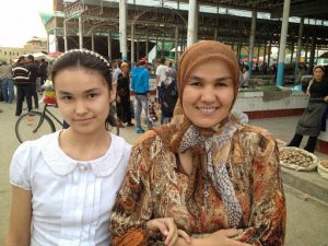 Uzbekistan: Fergana City ????mother and daughter at Eski market.