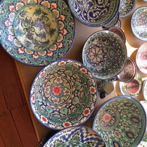 Uzbekistan: Fergana Valley, Rishton Rustam Usmanov pottery for sale to tourists; they