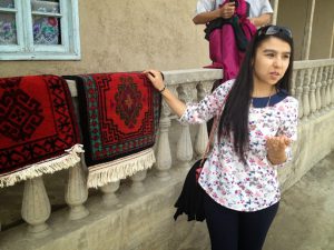 Uzbekistan: Fergana Valley, Rishton The Bahrom family weavers: our guide Halida