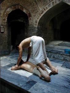 Uzbekistan: Bukhara Bozori Cord hammam; another massage position that stretches the