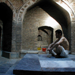 Uzbekistan: Bukhara inside the bathhouse Bozori Cord; a customer awaits his