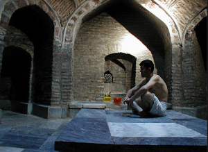 Uzbekistan: Bukhara inside the bathhouse Bozori Cord; a customer awaits his