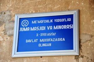 Uzbekistan: Khiva sign for Juma mosque and minaret.