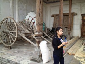 Uzbekistan: Kokand City Khan Palace - our lovely guide explaining modes