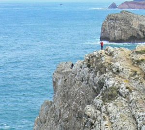 Portugal, Sagres Town: fishermen on steep cliffs