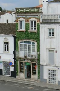 Portugal, Estremoz: tiled face of a shop