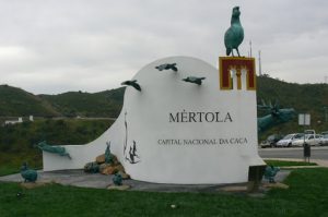 Portugal, Mertola: The entrance monument is modern and decorated with wildlife; notice