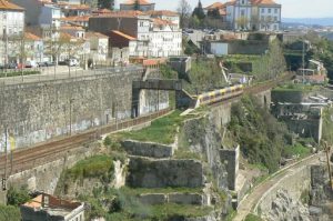 Portugal, Porto City: ancient stone ruins  and modern structures